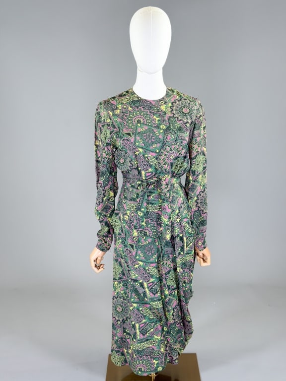 Vintage 1940s Cold Rayon Printed Day Dress: Vintage 1940s Cold Rayon Printed Day Dress having side and back zip closures and belt at waist. Measuring 36 inch bust, 26 inch waist, 46 inches long, 25 inch sleeve length.