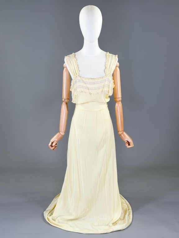 Vintage 1940s Rayon Lace Slip Dress Night Gown: Vintage 1940s Rayon Lace Slip Dress Night Gown having lace details at bust with attached tie at waist. Measuring 34-42 inch bust, 24-40 inch waist, 61 inches long. General wear as shown throughout.