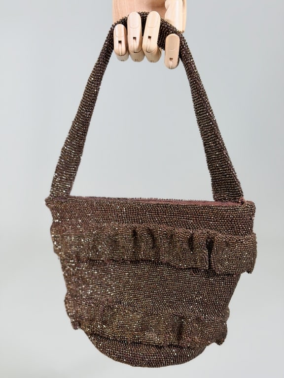 Vintage 1940s Glass Beaded Ruffle Evening Purse: Vintage 1940s Glass Beaded Ruffle Evening Purse Bag having metal frame closure with ruffled details throughout. Measuring approximately 7 inches high by 9 inches wide by 5.5 inches deep.