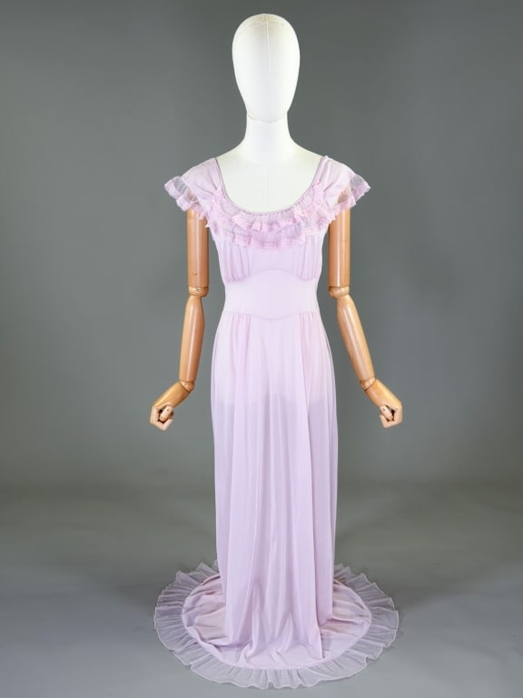 Vintage 1950s Nylon Knit Lace Slip Dress: Vintage 1950s Nylon Knit Lace Slip Dress having lace details with stretch throughout. Marked size 34. Measuring 32-36 inch bust, 26-32 inch waist, 55 inches long.