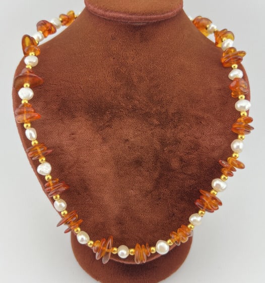 Baltic Amber & Baroque Pearl Necklace Strand: Baltic Amber & Baroque Pearl Necklace Strand. Having alternating sections of Baltic amber beads and baroque pearls with beads on either side. Measures 18 inches in length.