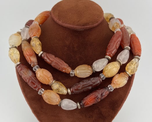 Estate Hand Carved Citrine Bead Necklace Strand: Estate Hand Carved Citrine Bead Necklace Strand. Impressive artisan made necklace strand with hand carved and briolette faceted beads including citrine, rock crystal, agate, quartz. Clasp is hallmarke