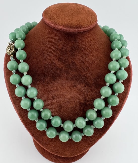 Estate Hand Knotted Nephrite Jade Necklace Strand: Estate Hand Knotted Green Nephrite Jade Necklace Strand. Having a Chinese export style filigree clasp. Beads are approximately 6mm in size and test as Nephrite on the Presidium. Measures 31 inches in 