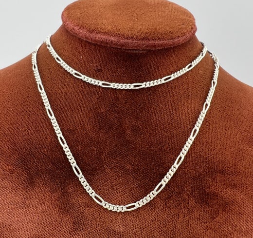 Vintage Italian Sterling Figaro Necklace Chain: Vintage Italian Sterling Silver Figaro Link Necklace Chain. Hallmarked 925 and stamped ITALY. New old stock from a jewelry store liquidation. Measures 24 inches in length.