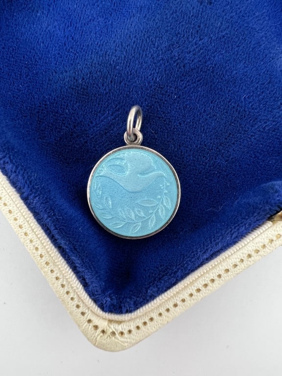 Sterling Silver & Blue Enamel Religious Medal: Sterling Silver & Blue Enamel Religious Medal. Necklace pendant or charm. Hallmarked. Scene with dove on the front. Measures just over 1 inch in length.