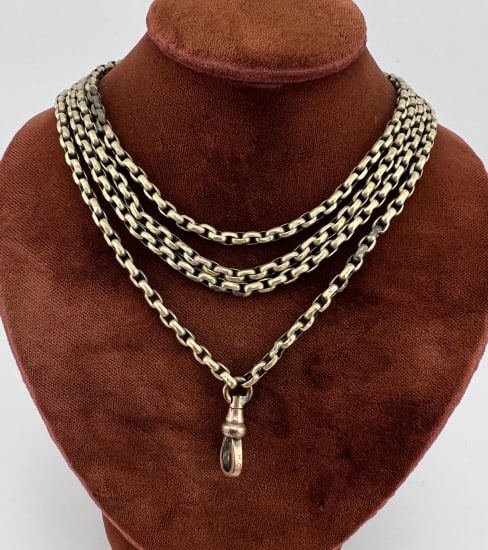 Antique 19th C Gold Filled Watch Chain Necklace: Antique 19th C Gold Filled Watch Chain Necklace w Dog Clip. Pocket watch chain / guard chain necklace is yellow gold filled with dog clip. Measures 48 inches in length.