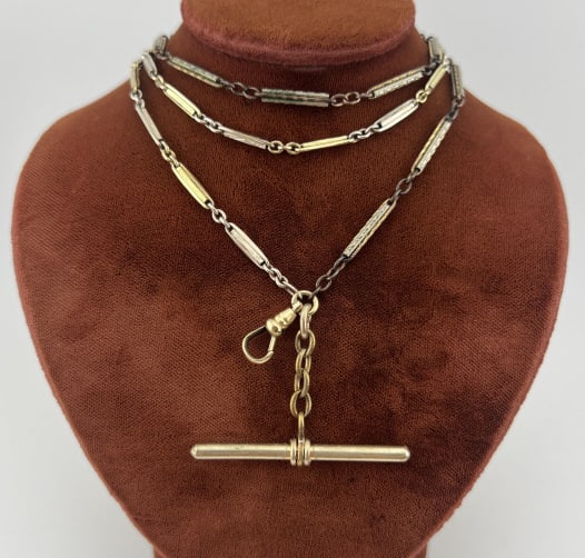 Antique Gold Fill Watch Chain Necklace w Dog Clip: Antique Gold Filled Watch Chain Necklace w Dog & T Bar. Two tone and patterned chains, spring ring clasp, dog clip for pendants etc, T bar. Chain measures 26 inches in length.