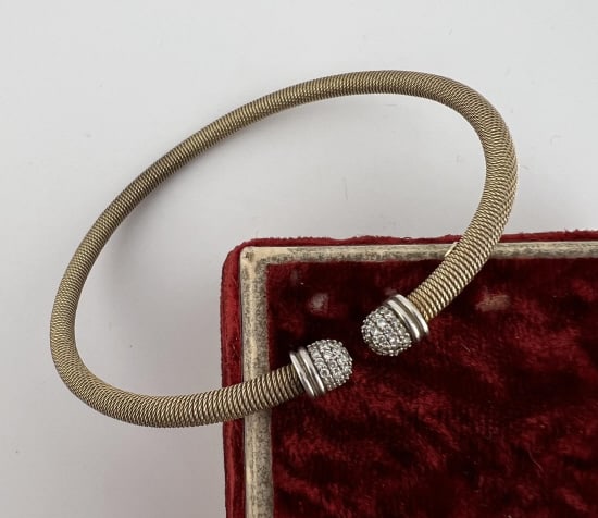 Italian Gold Over Sterling Silver & Pave Bracelet: Italian Gold Over Sterling Silver & Pave Bracelet. David Yurman style. Slightly adjustable in size, both ends with pave, interior with hallmarks / plaque. Measures just under 2.75 inches across the in