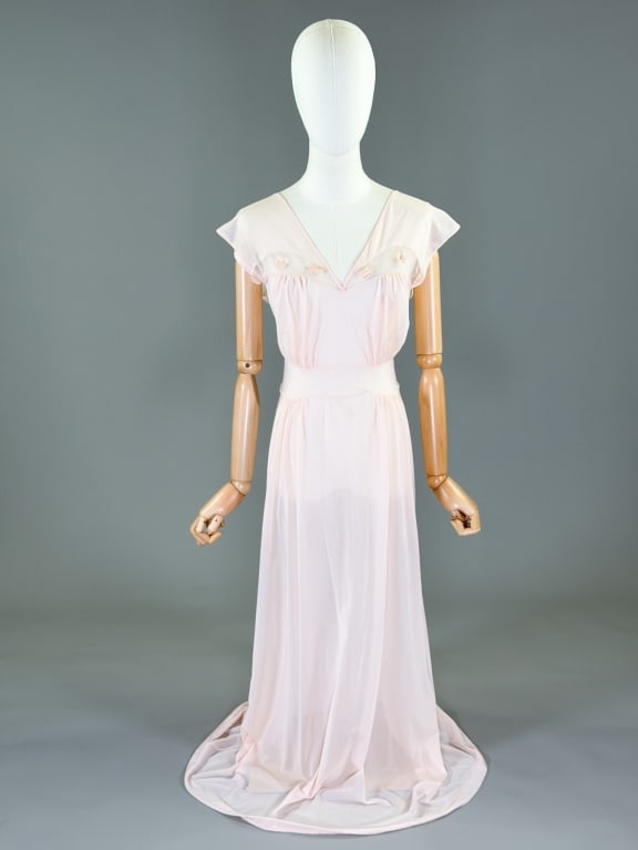 Vintage 1960s Nylon Knit Slip Dress Night Gown: Vintage 1960s Nylon Knit Slip Dress Night Gown with floral details at bust. Marked size 36. Measuring 34-42 inch bust, 26-34 inch waist, 56 inches long.