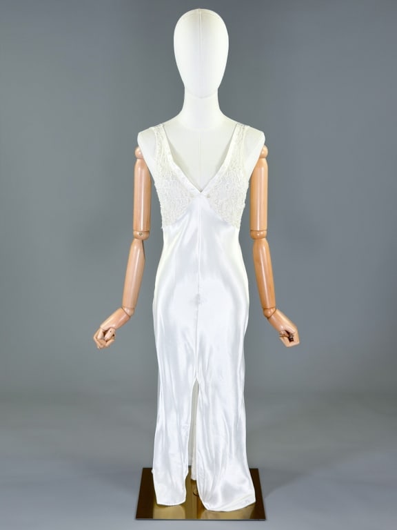 Vintage 1970s Satin Lace Art Deco Bias Slip Dress: Vintage 1970s Satin Lace Art Deco Bias Slip Dress having lace bus in 1930s art deco style bias cut with stretch throughout. Marked size Petit. Measuring 32-36 inch bust, 24-34 inch waist, 48 inches lo