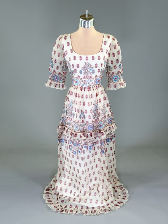 Vintage 1970s Floral Printed Chiffon Maxi Dress: Vintage 1970s Floral Printed Chiffon Maxi Dress having back zip closure. Measuring 32 inch bust, 24 inch waist, 51 inches long, 14 inch sleeve length. General wear as shown throughout.