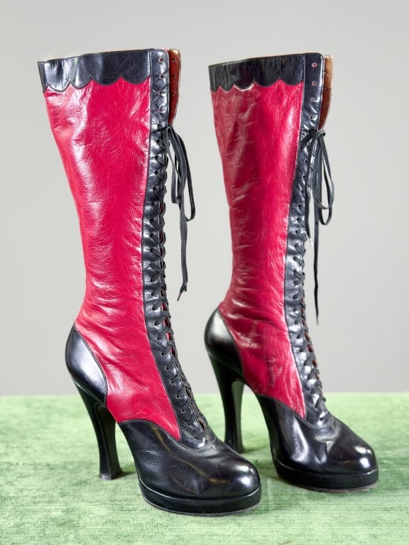 Vintage 1960s Leather Fetish Dominatrix Boots: Vintage 1960s Leather Fetish Dominatrix Boots having lace up front with scallop detail at edge. Marked Victor NYC on bottoms. Measuring approximately 17.5 inches total length, 5 inch heel height, 10 i