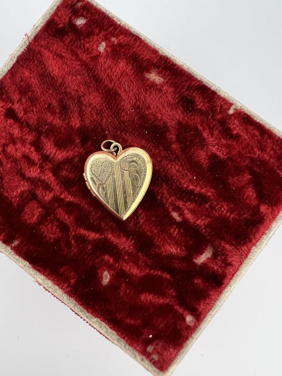 Vintage Gold Filled Heart Form Locket Pendant: Vintage Gold Filled Heart Form Locket Pendant. Having an Art Deco style engraved design. Measures approximately .75 of an inch in length.