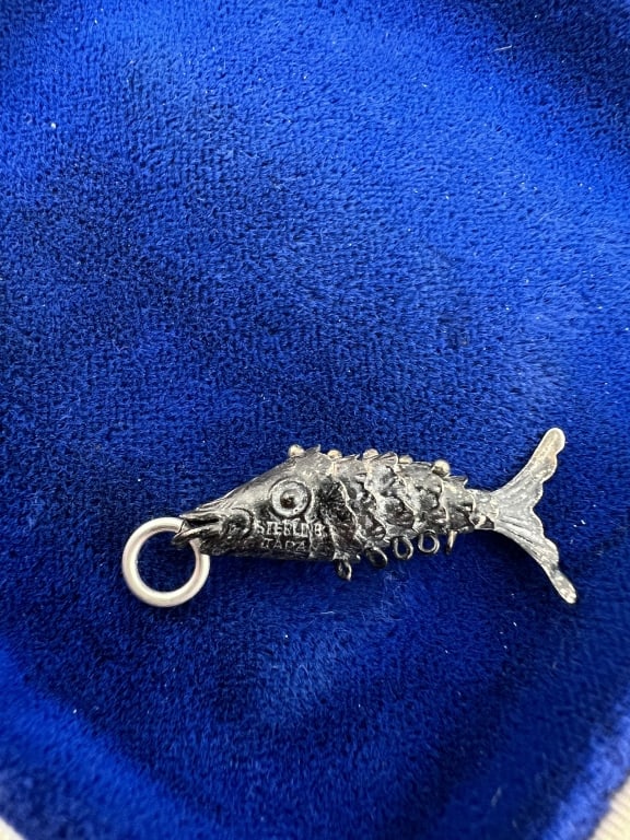 Vintage Sterling Articulated Koi Fish Pendant: Vintage Sterling Silver Articulated Koi Fish Necklace Pendant or Charm. Stamped STERLING JAPAN. Measures just over 1.25 inches in length.