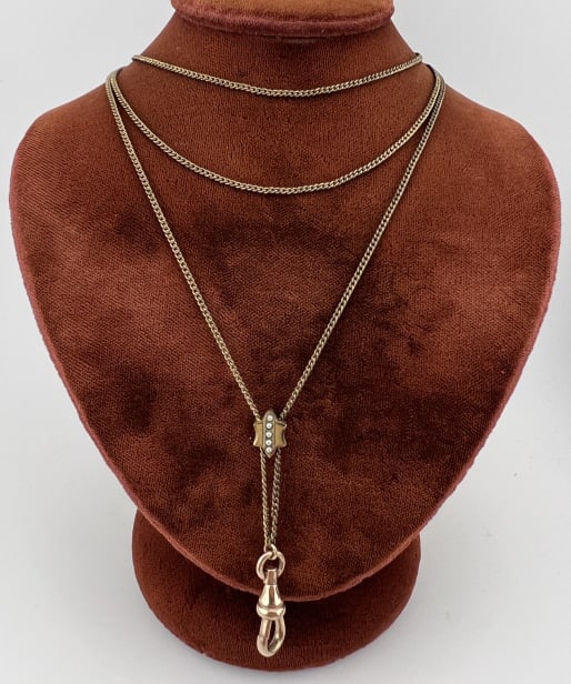 Antique 19th C Gold Filled Chain w 10kt Gold Slide: Antique 19th C Gold Filled Watch Chain w 10kt Gold Slide. Slide is set with seed pearls. Front and back panels of the slide acid test as 10kt gold. Chain / dog clip gold filled. Chain measures approxi