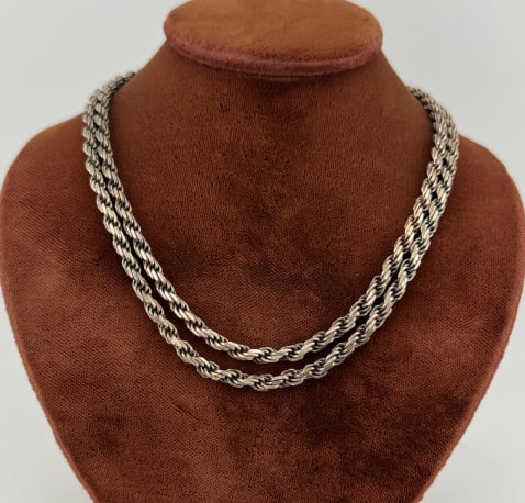 Italian Sterling Silver Heavy Rope Twist Necklace: Italian Sterling Silver Heavy Rope Twist Necklace Chain. Hallmarked for sterling and marked ITALY. Measures 24 inches in length. Weighs approximately 21 grams.
