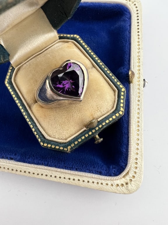 Sterling Silver & Solitaire Iolite Heart Ring: Sterling Silver & Solitaire Iolite Heart Ring. Ring setting is hallmarked for sterling and stone tests as iolite on the Presidium, possibly treated / enhanced. Ring size 8