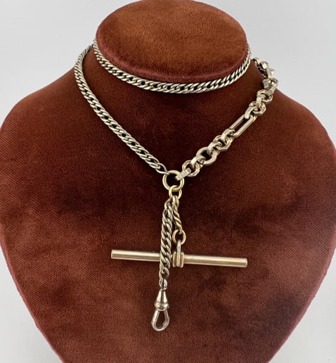 Antique 19th C Gold Filled Watch Chain Necklace: Antique 19th C Gold Filled Watch Chain Necklace w T Bar & Dog. Having a dog clip for the clasp, curb link and faceted trombone link design chains, T bar and dog clip for pendant / charms. Including go