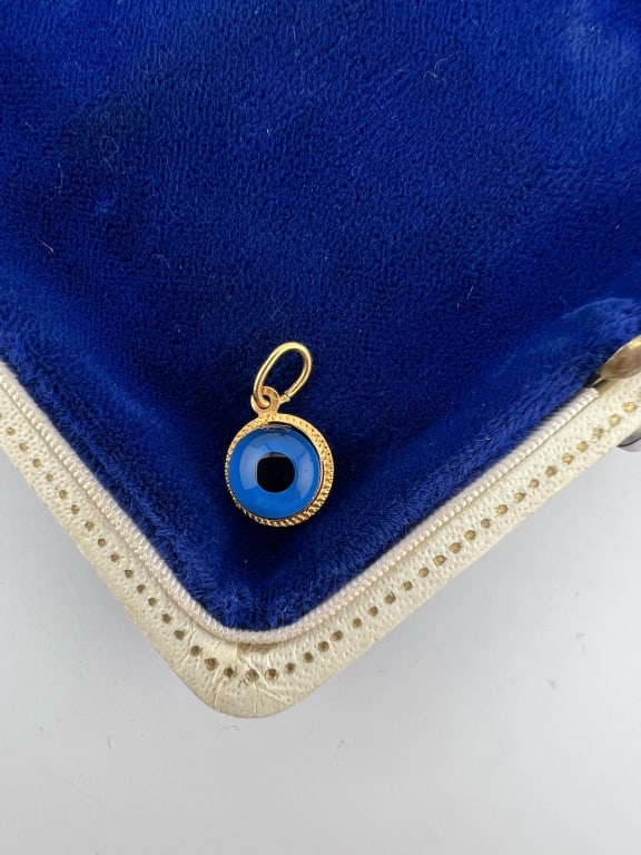 Estate Gold Plated & Art Glass Evil Eye Pendant: Estate Gold Plated & Art Glass Evil Eye Pendant / Charm. Measures nearly .75 of an inch in length.