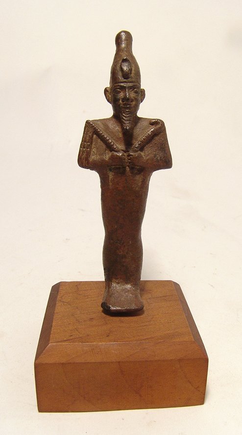 Beautiful Egyptian bronze figure of Osiris, Late Period: A nice Egyptian bronze figure of Osiris, Late Period, c. 664 – 332 BC, the God of the Underworld is depicted mummiform, wear Atef Crown with uraeus and false beard, arms folded at chest, hands clutc