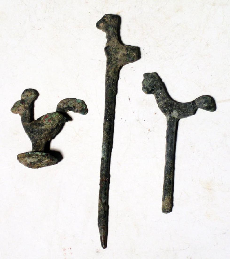 A trio of Near Eastern bronze bird finials (1 of 1)