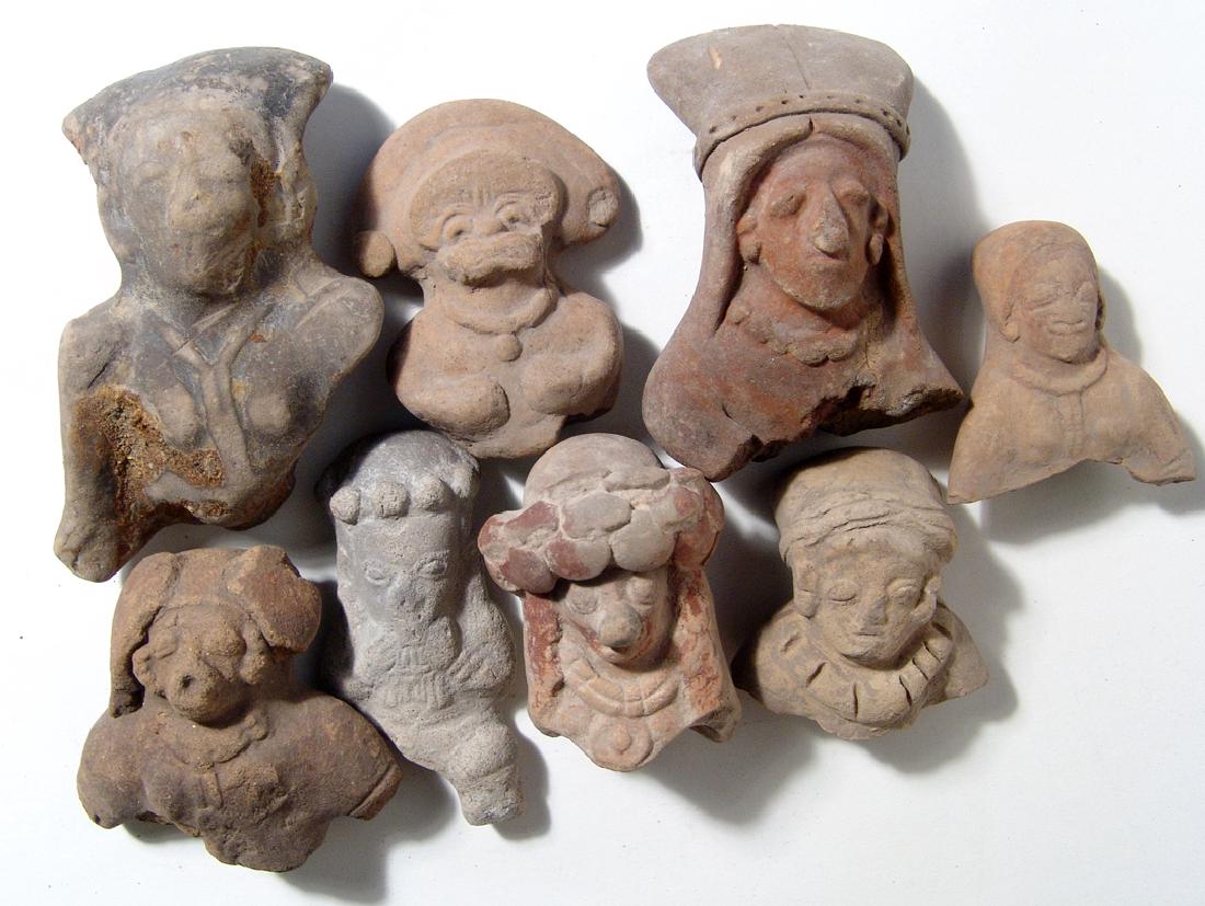 A group of 8 Ecuadoran ceramic heads (1 of 2)