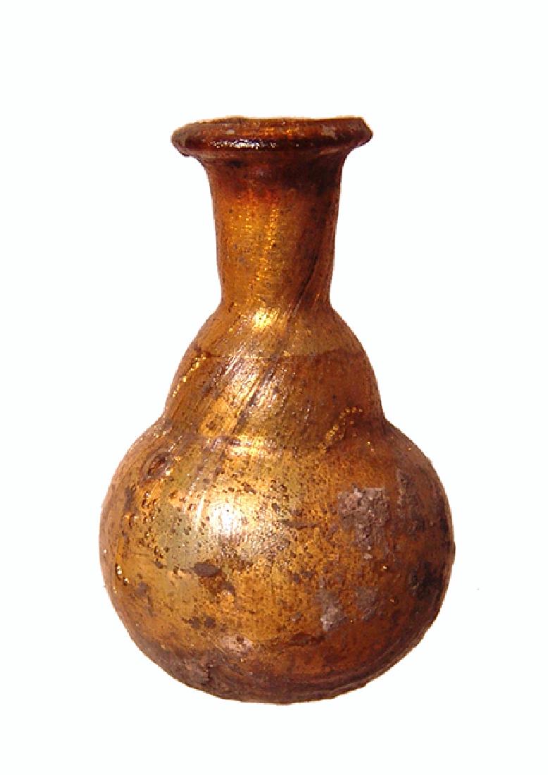 A beautiful little Roman golden yellow glass bottle (1 of 3)