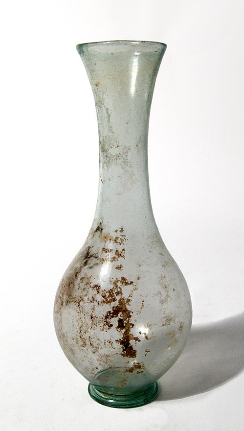 A late Roman pale green glass bottle (1 of 2)