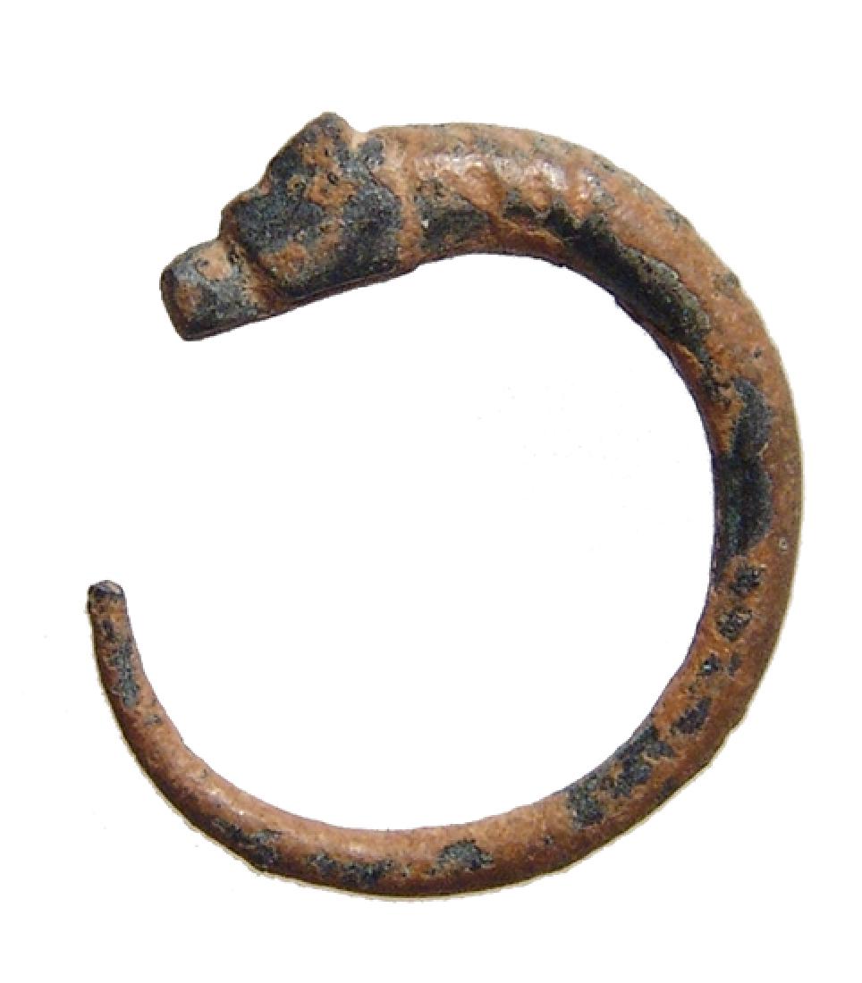 An attractive Greek bronze earring (1 of 2)