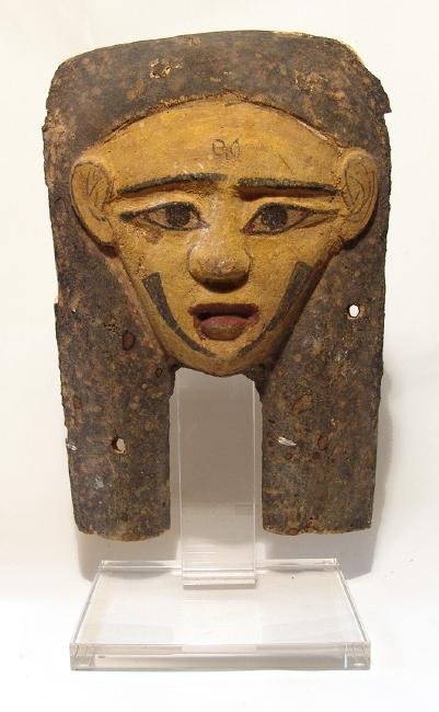 Choice Egyptian painted wood 'mummy' mask, Late Period (1 of 3)