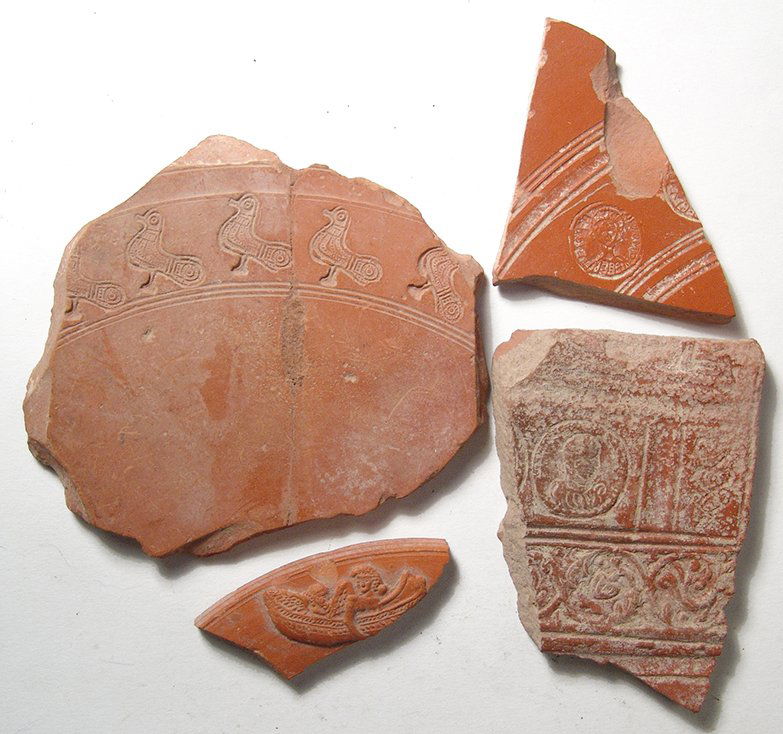 A group of 4 Roman Terra Sigillata pottery fragments (1 of 5)