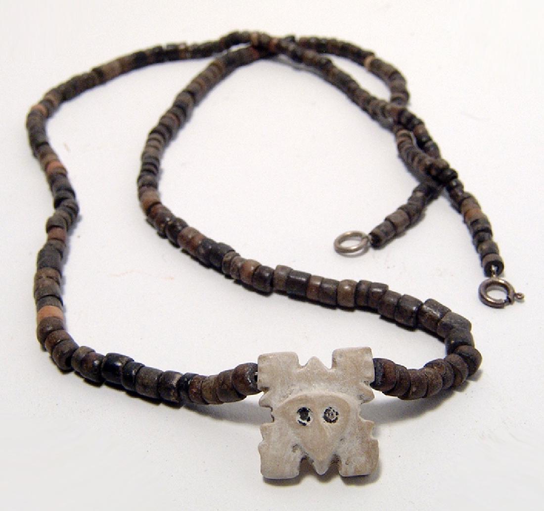A Chimu beaded necklace with shell pendant (1 of 3)