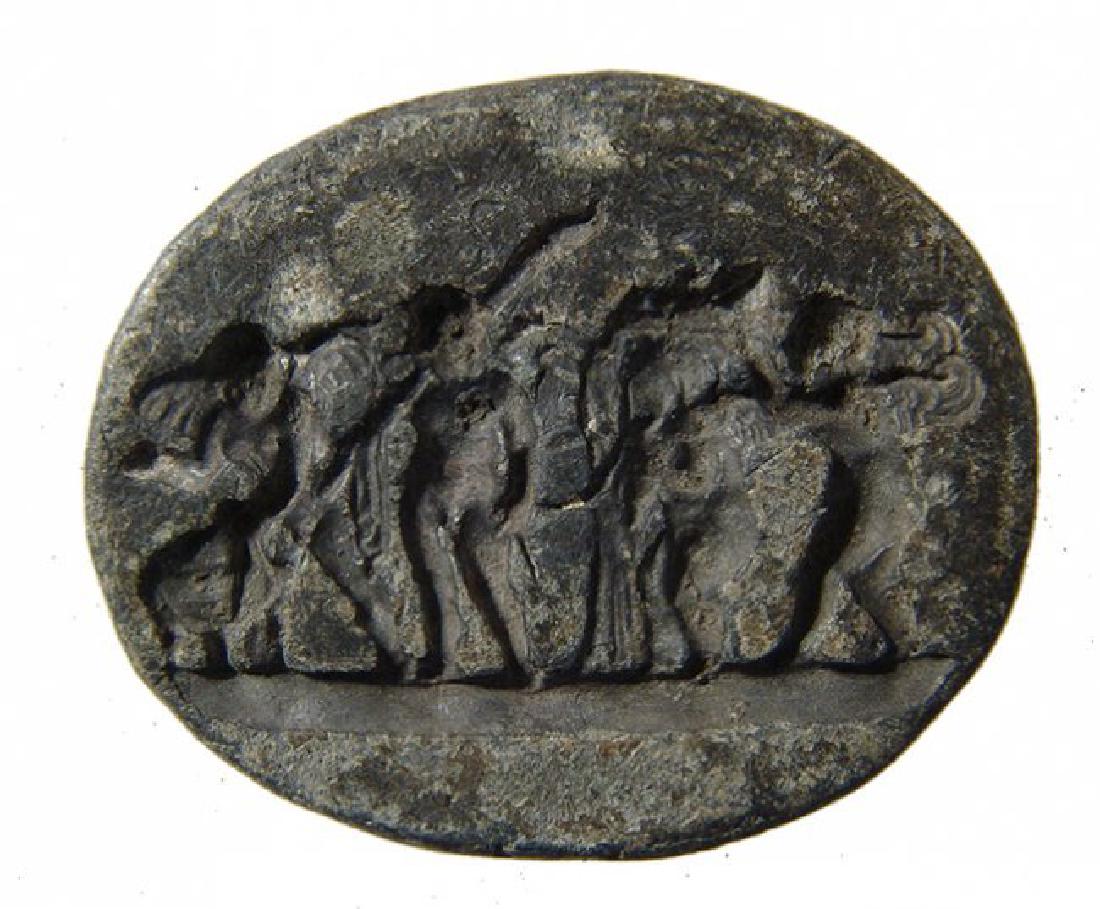 Rare Roman lead seal depicting a detailed cherubic (1 of 2)