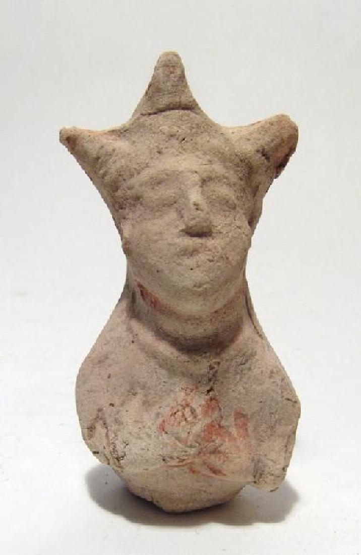 An Eastern Greek terracotta rattle figure of a woman (1 of 3)