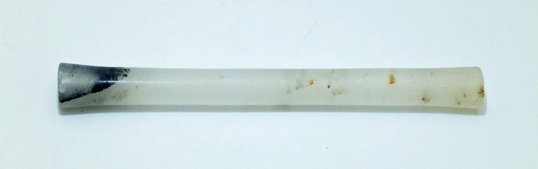 An exceptional Calima tube bead from Colombia: An exceptional Calima tube bead from Colombia, c. 300 BC - 300 AD. This unusually large example is made from translucent quartz crystal and is bi-conically drilled, L: 4 in. Ex New World Artifacts Gal