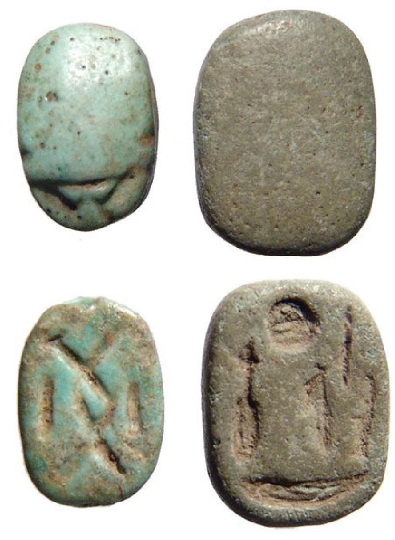 A pair of Egyptian New Kingdom faience scarabs: A pair of Egyptian New Kingdom faience scarabs, c. 1570 - 1075 BC. The first with twisted cord on base. 10 X 7 mm. Nice for size. Cf. Matouk II 2075 var; Ex collection Albert F. Pagnon, Luxor, acquire