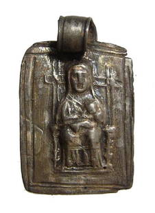 A Roman silver pendant depicting a mother goddess: A Roman silver pendant depicting a mother goddess, c. 2nd-3rd Century AD, the image in relief seated facing on a high-backed throne, left hand on her breast, right hand in her lap, incised rectangular