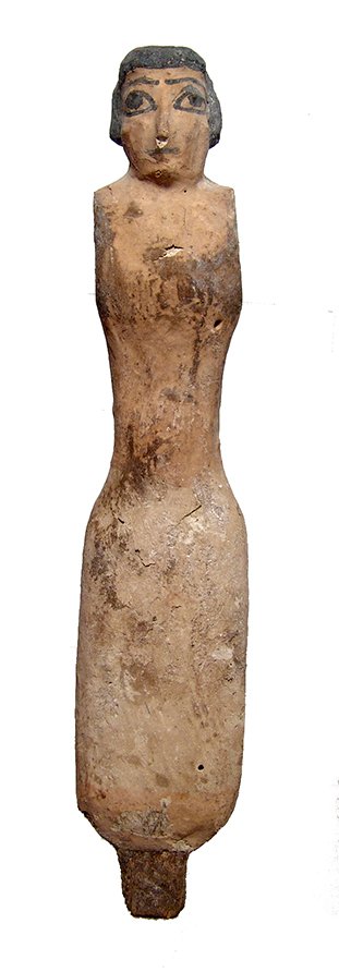 A tall Egyptian wooden figure, Middle Kingdom (1 of 4)