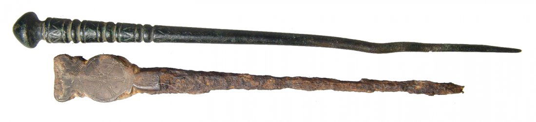A pair of ancient and antique pins (1 of 3)
