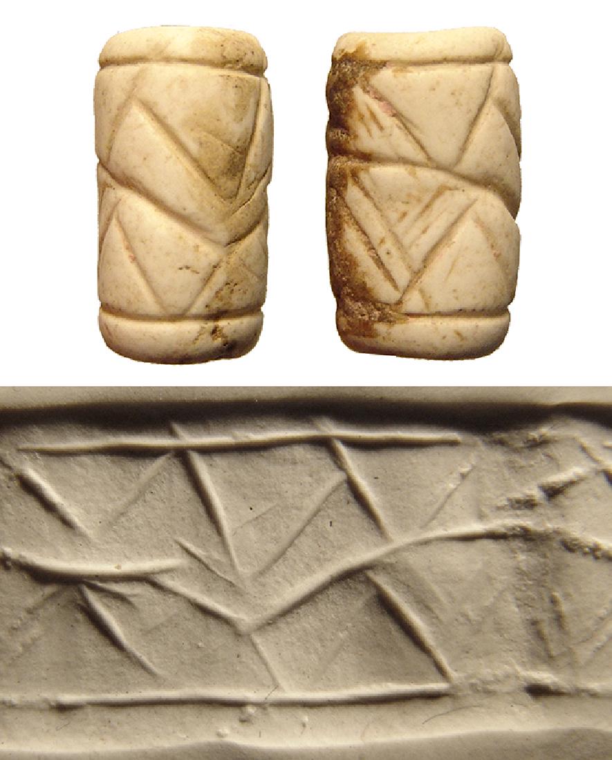 A Sumerian white marble cylinder seal (1 of 1)