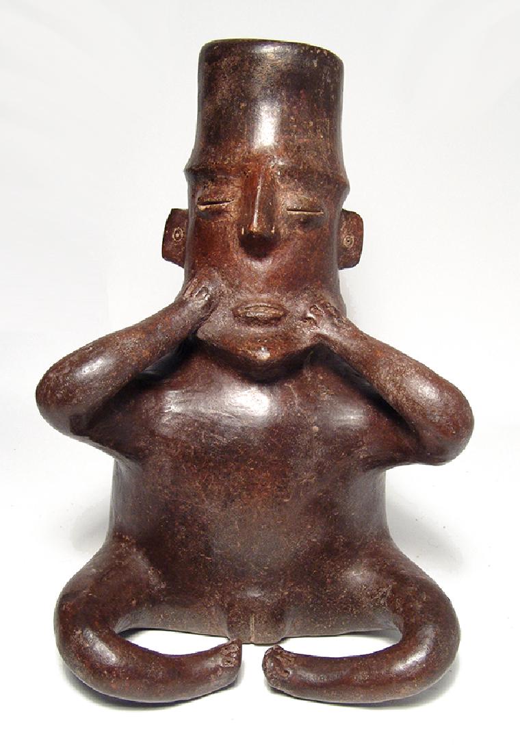 Colima brown-ware effigy vessel of a seated woman (1 of 4)