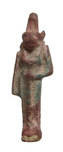 An Egyptian faience amulet of Sekhmet, Late Period: An Egyptian faience amulet of Sekhmet, Late Period, c. 664 - 30 BC, wearing a tall headdress and holding a sceptre to her breast; suspension loop through headdress. H: 1 2/5 in (3.6 cm).