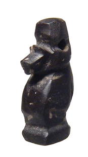 A nice Egyptian black serpentine amulet of a baboon: A nice Egyptian black serpentine amulet of a baboon, Late Period, c. 664 - 332 BC, representing the god Thoth seated on an integral base, the head nicely modeled and surmounted by a suspension loop.