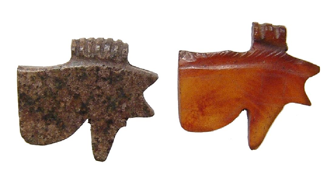 Pair of attractive Egyptian 'Eye of Horus' amulets: pair of attractive stone Egyptian 'Eye of Horus' amulets. One in brown serpentine with nice style and horizontal frill for suspension, (16 x 14 mm), the second in translucent carnelian, (15 x 15 mm). 