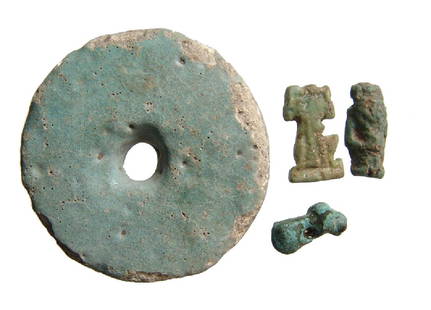 Egyptian faience items and Near Eastern bronze amulet: A group of 3 Egyptian faience items and a Near Eastern bronze amulet. Lot includes a pair of Egyptian faience amulets, Late Period, c. 664 - 30 BC, one of Shu and the other of Pataikos as well as a