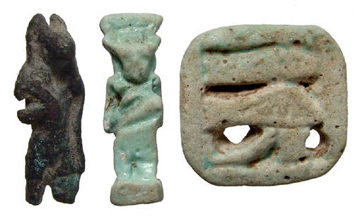 A lot of 3 Egyptian bronze and faience items: A lot of 3 Egyptian bronze and faience items, Late Period, c. 664 - 30 BC, and include a light blue faience Eye of Horus plaque (25 x 25 mm), a bronze amulet of Anubis (28 mm), and a pale blue