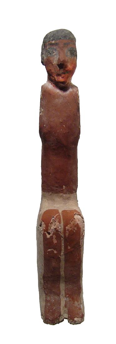 A large Egyptian wooden figure, Middle Kingdom (1 of 4)