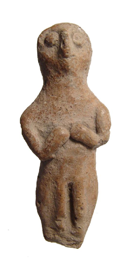 A Near Eastern terracotta fertility figure