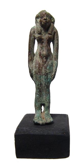 An Egyptian bronze figure of a goddess, perhaps Hathor (1 of 3)