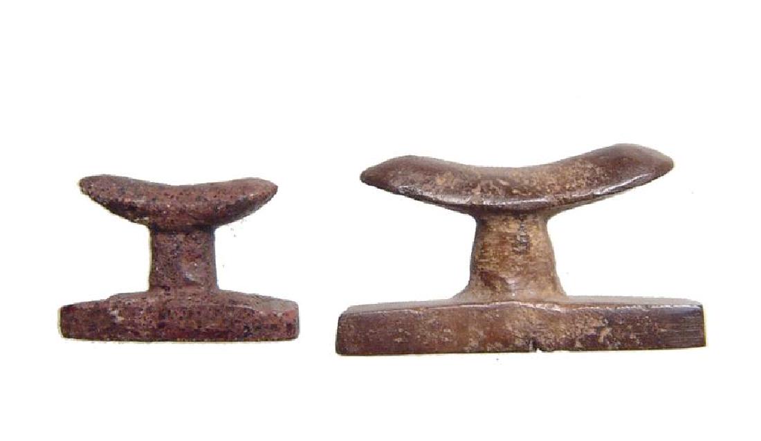 A pair of Egyptian stone headrest amulets, Late Period (1 of 2)